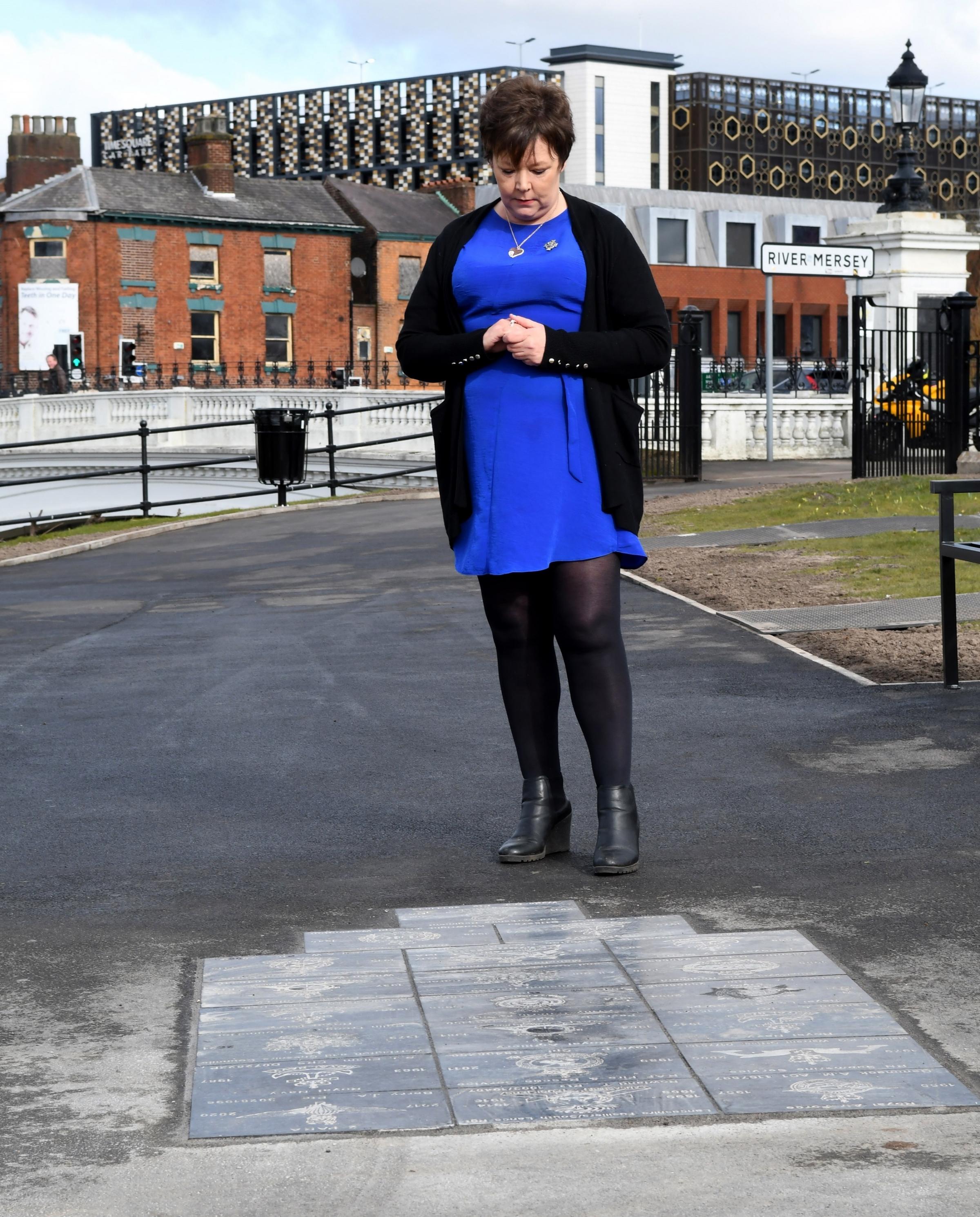 Lisa Billing looks at the first stones laid in the new Heroes Pathway 