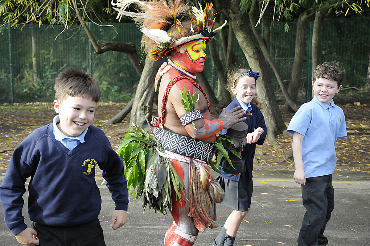 Stars of the Papua New Guinea Rugby League World Cup team delighted pupils at Sacred Heart Catholic Primary School and Bradshaw Primary School. Pictures: Mike Boden