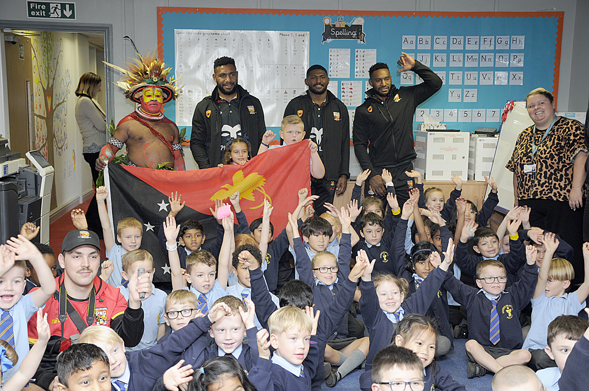 Stars of the Papua New Guinea Rugby League World Cup team delighted pupils at Sacred Heart Catholic Primary School and Bradshaw Primary School. Pictures: Mike Boden