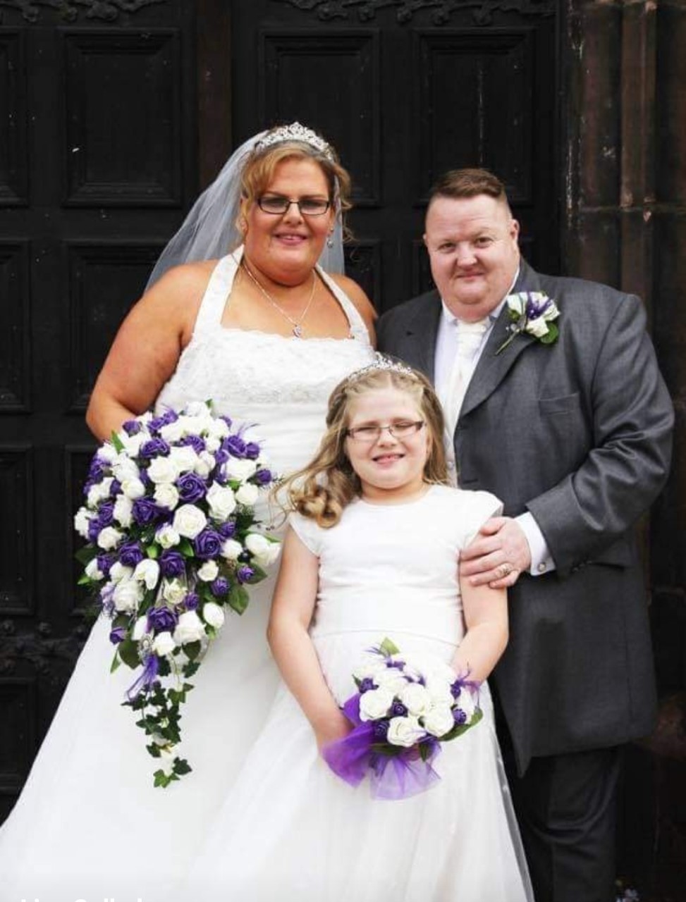 Lisa and Simon on their wedding daughter with their daughter Sophie