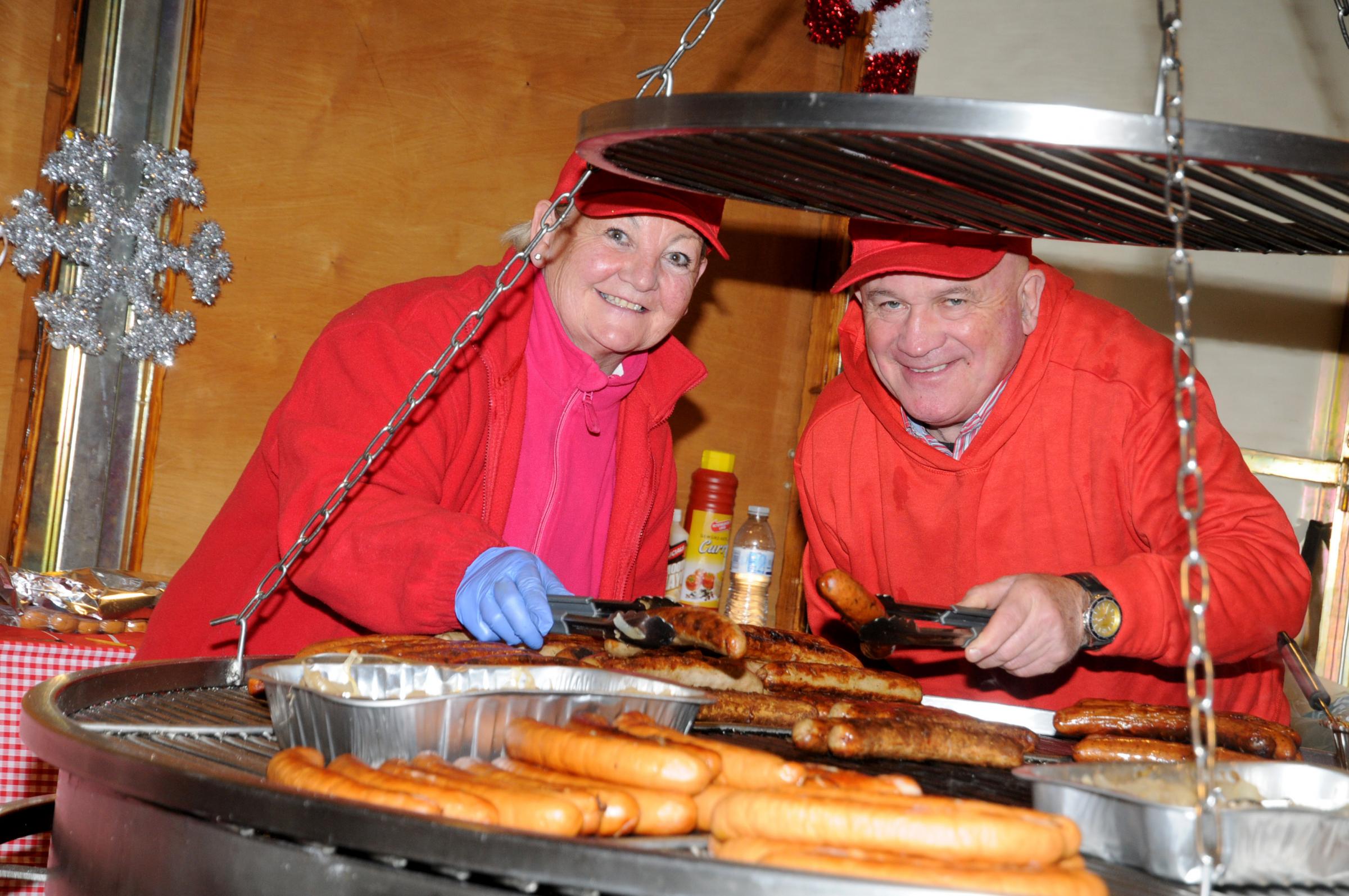 Bringing bratwurst to the town are Albert and Stella Hill