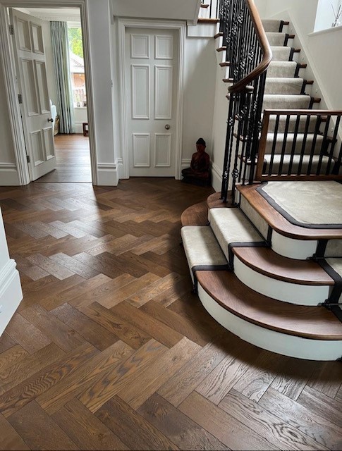 A stunning hallway into a beautiful home supplied and fitted by Steven Rogers Woodflooring