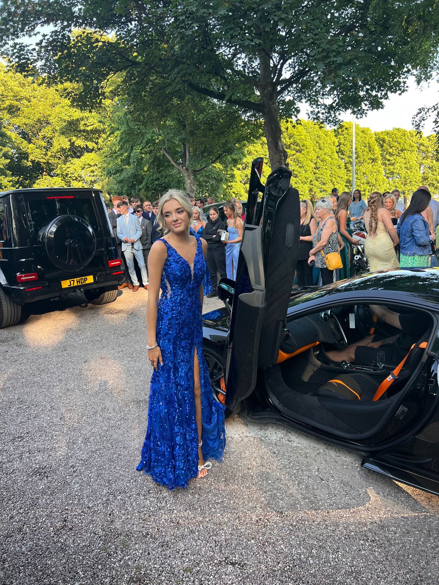 Chloe Jevons at Cardinal Newman Catholic High School arriving in style in a McLaren 570GT