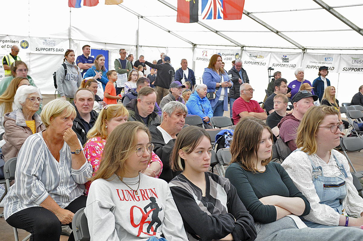 An audience in the main marquee