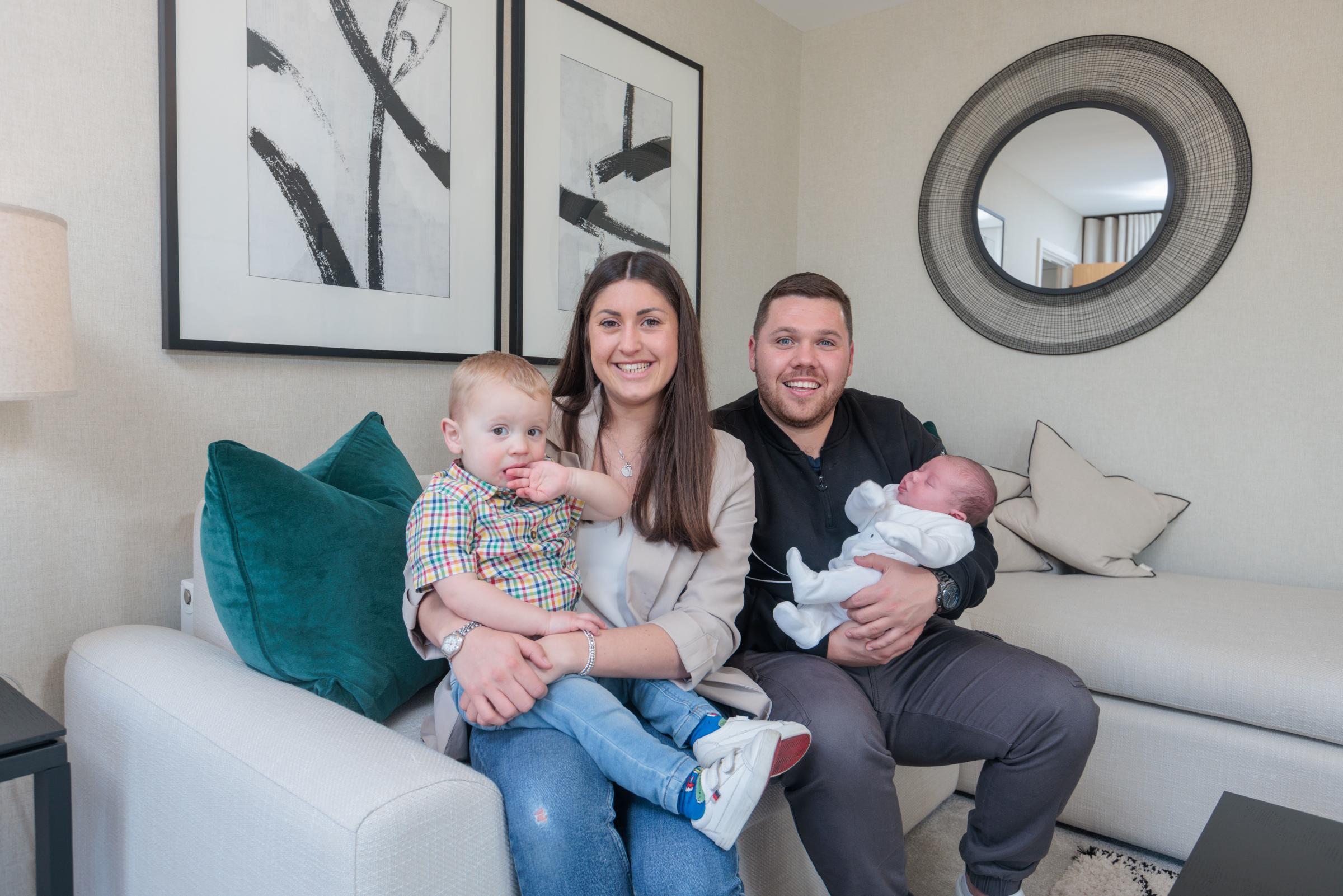 Victoria and Michael with their two children Louie and Freddie at the Rivers Edge home