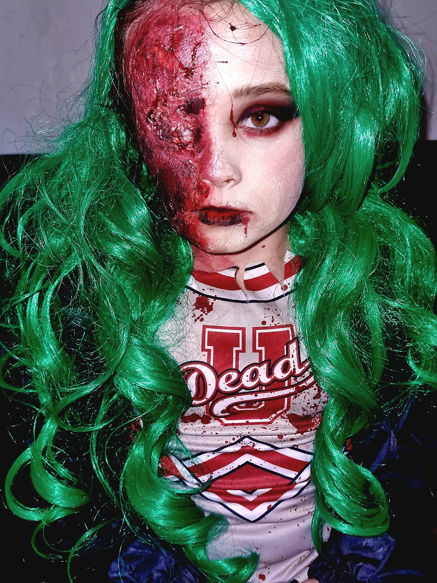 Violet Gerrard as a zombie cheerleader