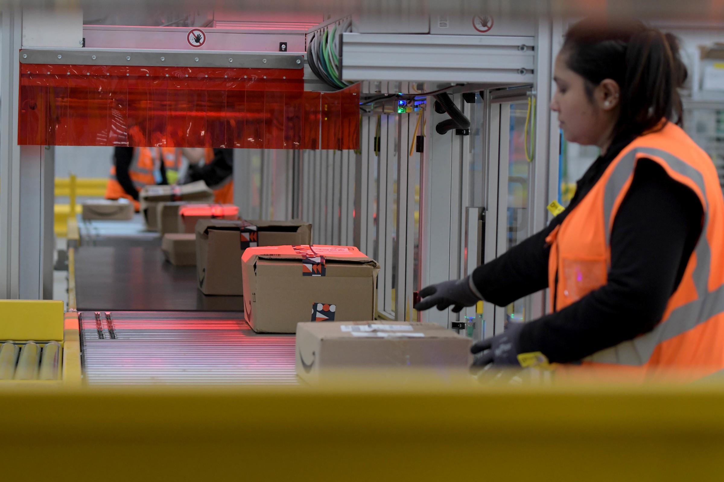 A worker sorts parcels