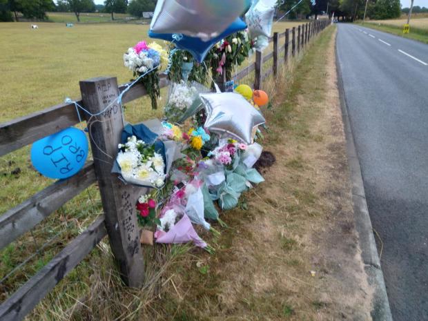 Floral tributes were left at the scene on Holcroft Lane in Culcheth