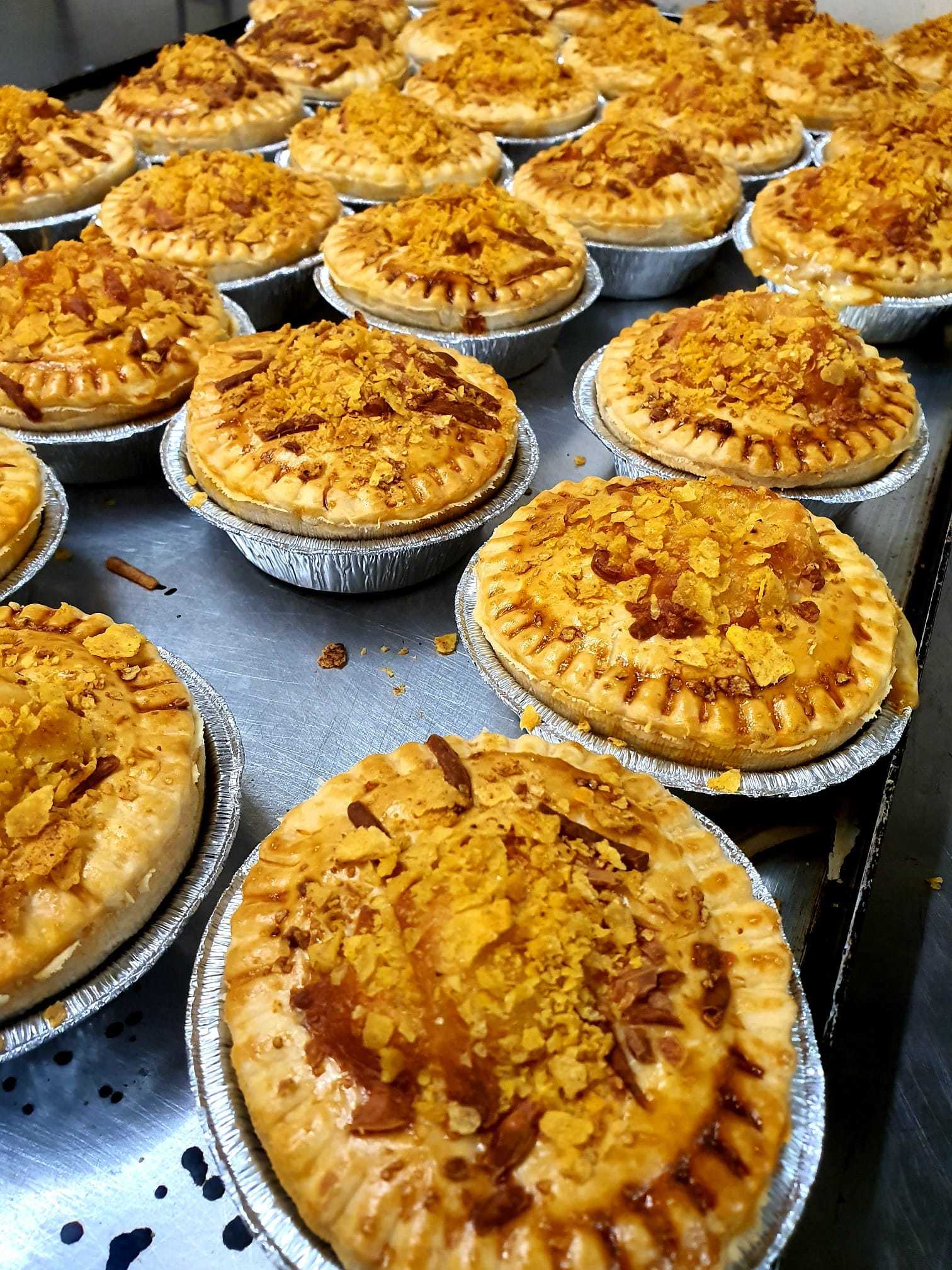 A tray of pies fresh from the oven