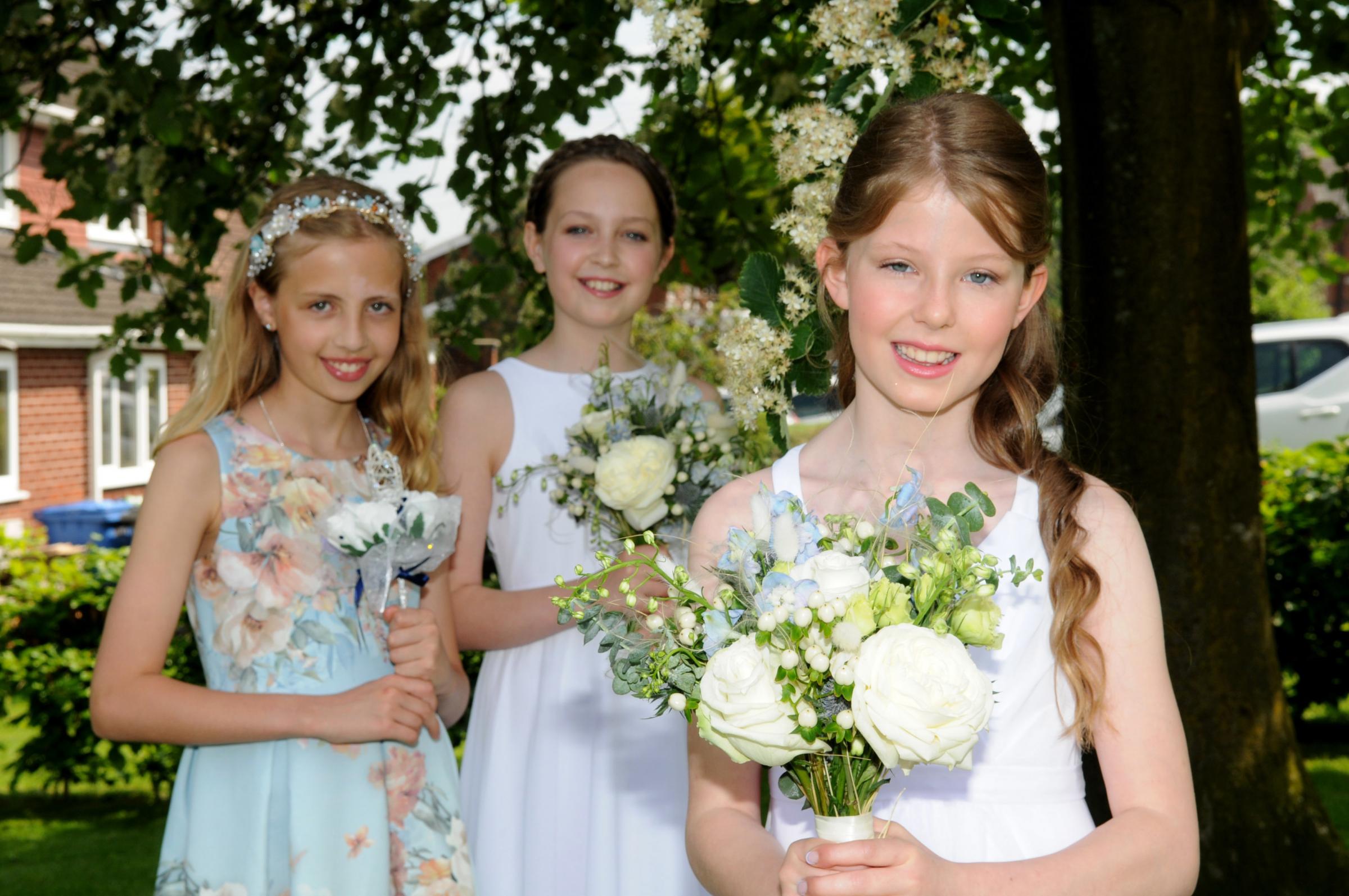 May Queen Eleanor McDonald ( on right) with lady in waiting Ella morris and Esma Gosling ( left ) flower girl