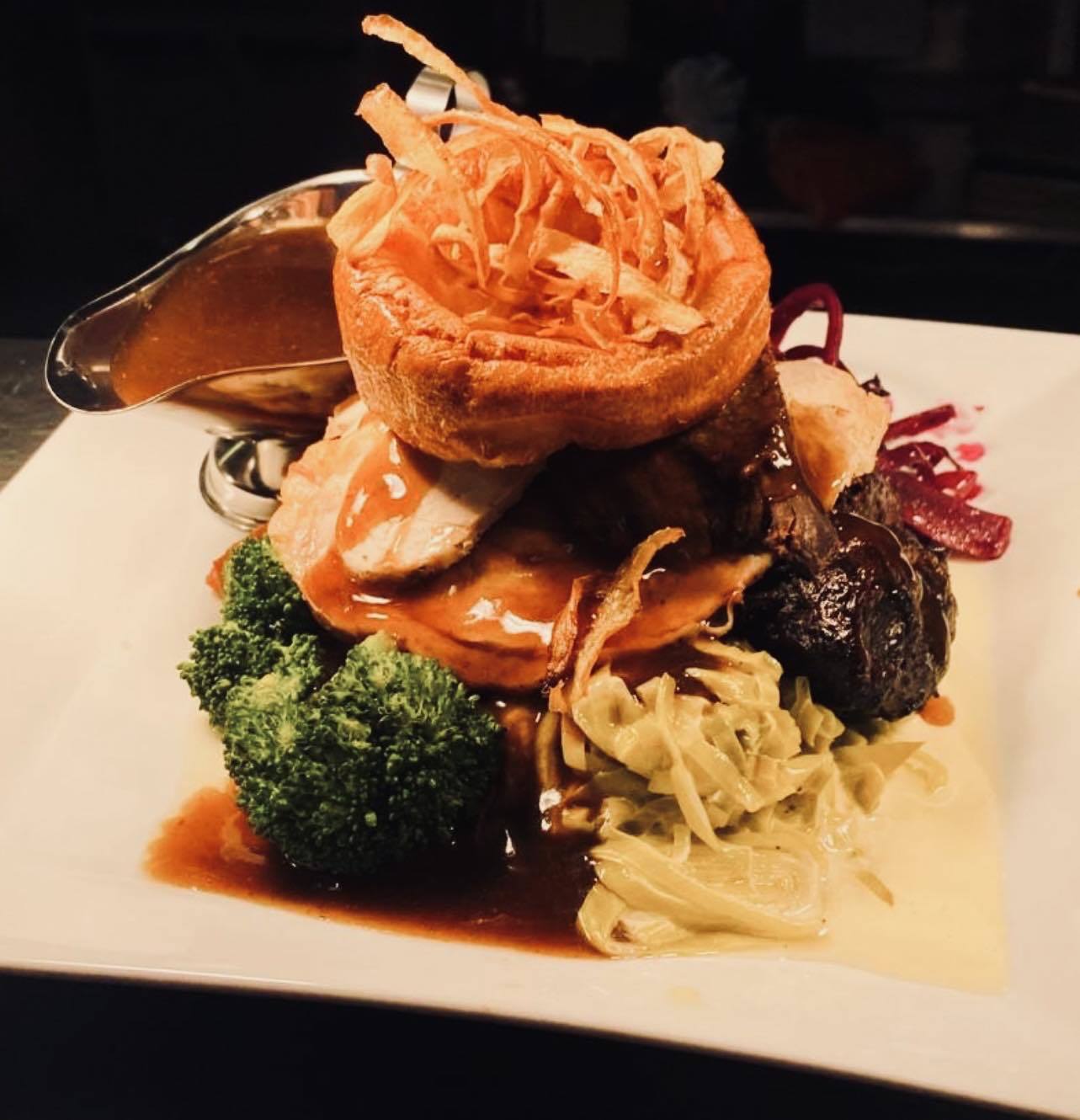 Roast dinners are served with Yorkshire puddings topped with shaved parsnips and lots of gravy