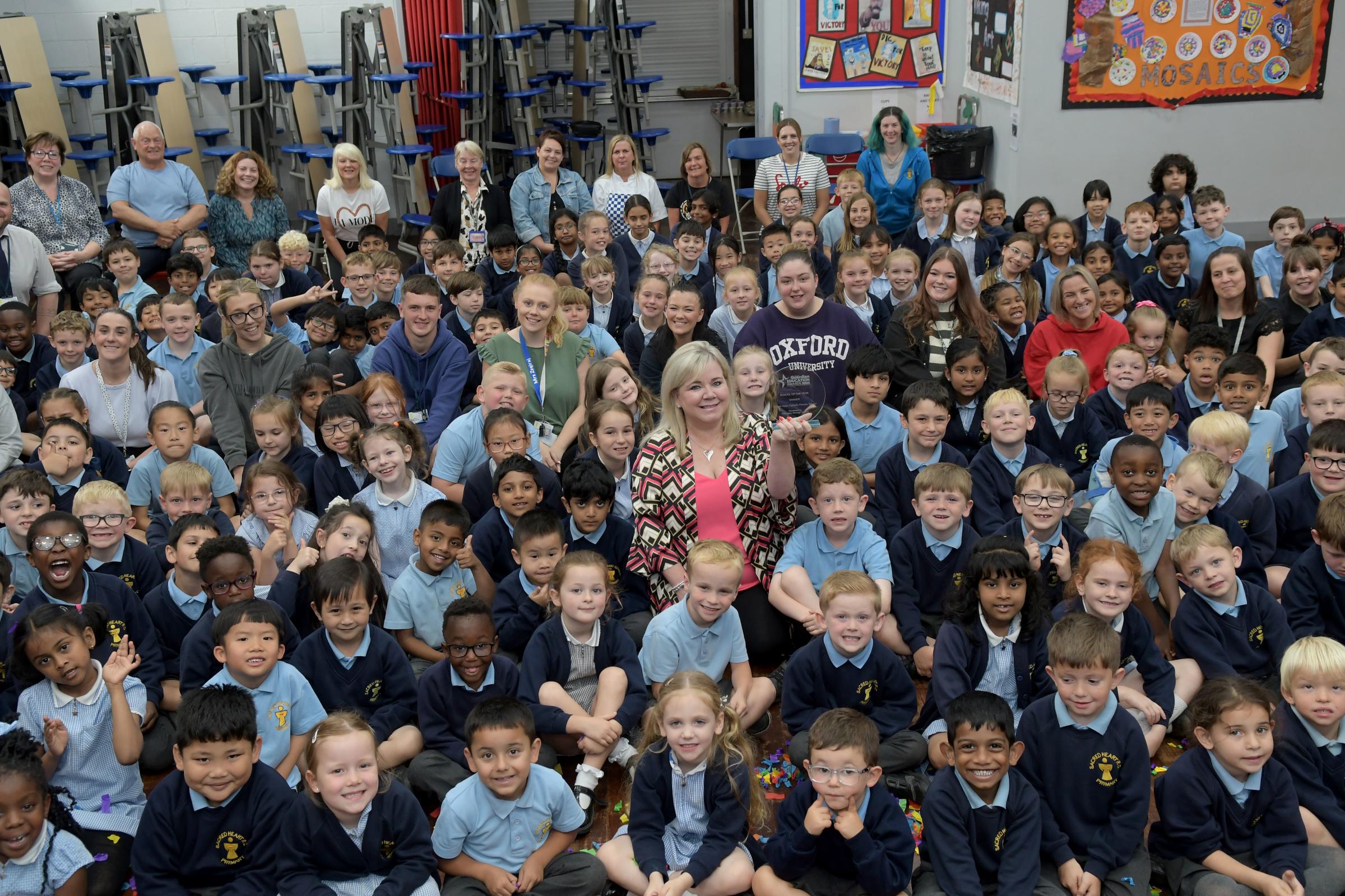 Head teacher Colleen Everett (centre) and her pupils