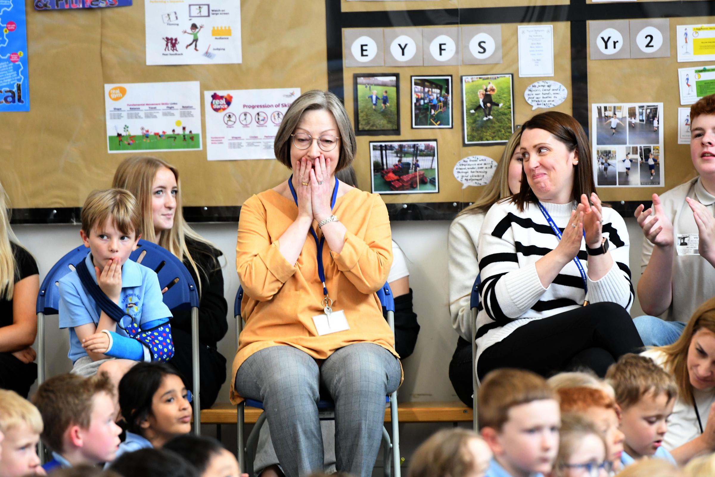 Janet was surprised with the award during a whole school assembly