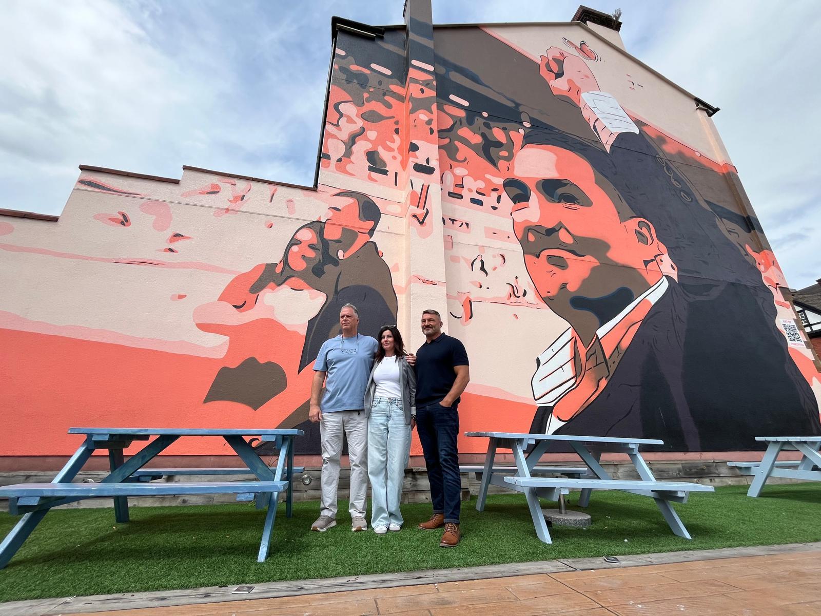 Paul and Anthony alongside Lyndsay Darbyshire, wife of Paul Darbyshire, who also features on the mural