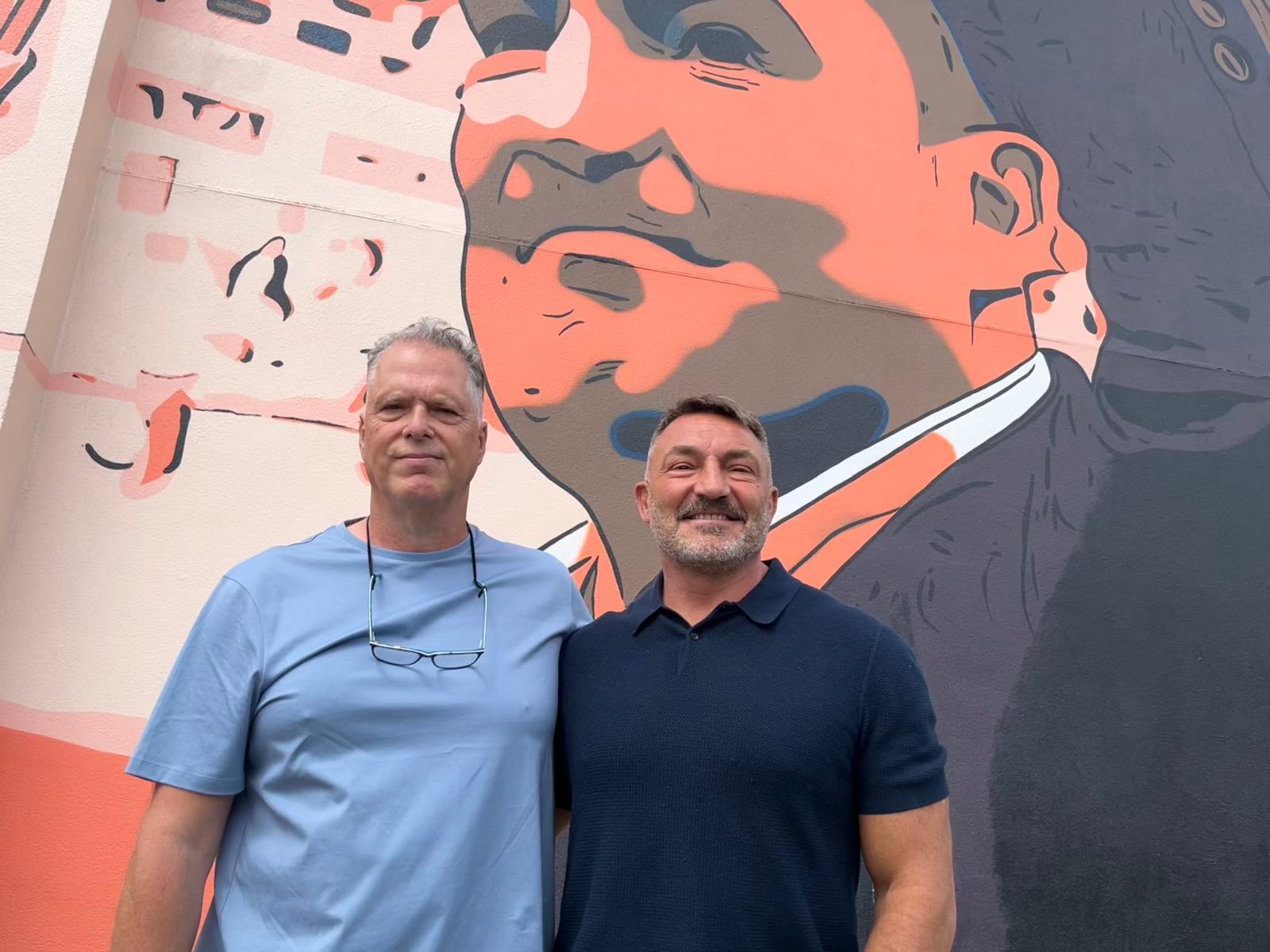 Artist Anthony Turk and Wire legend Paul Cullen at the mural