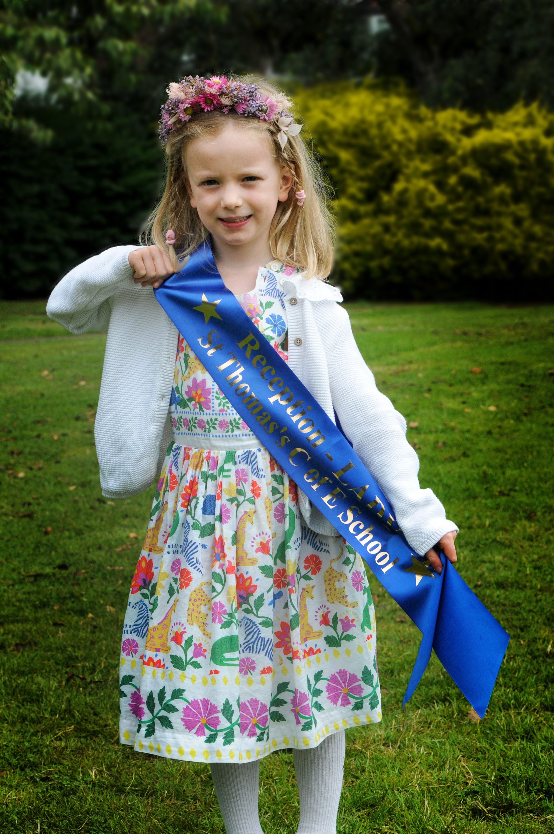 Mia Dunning, aged five, with St Thomas; School