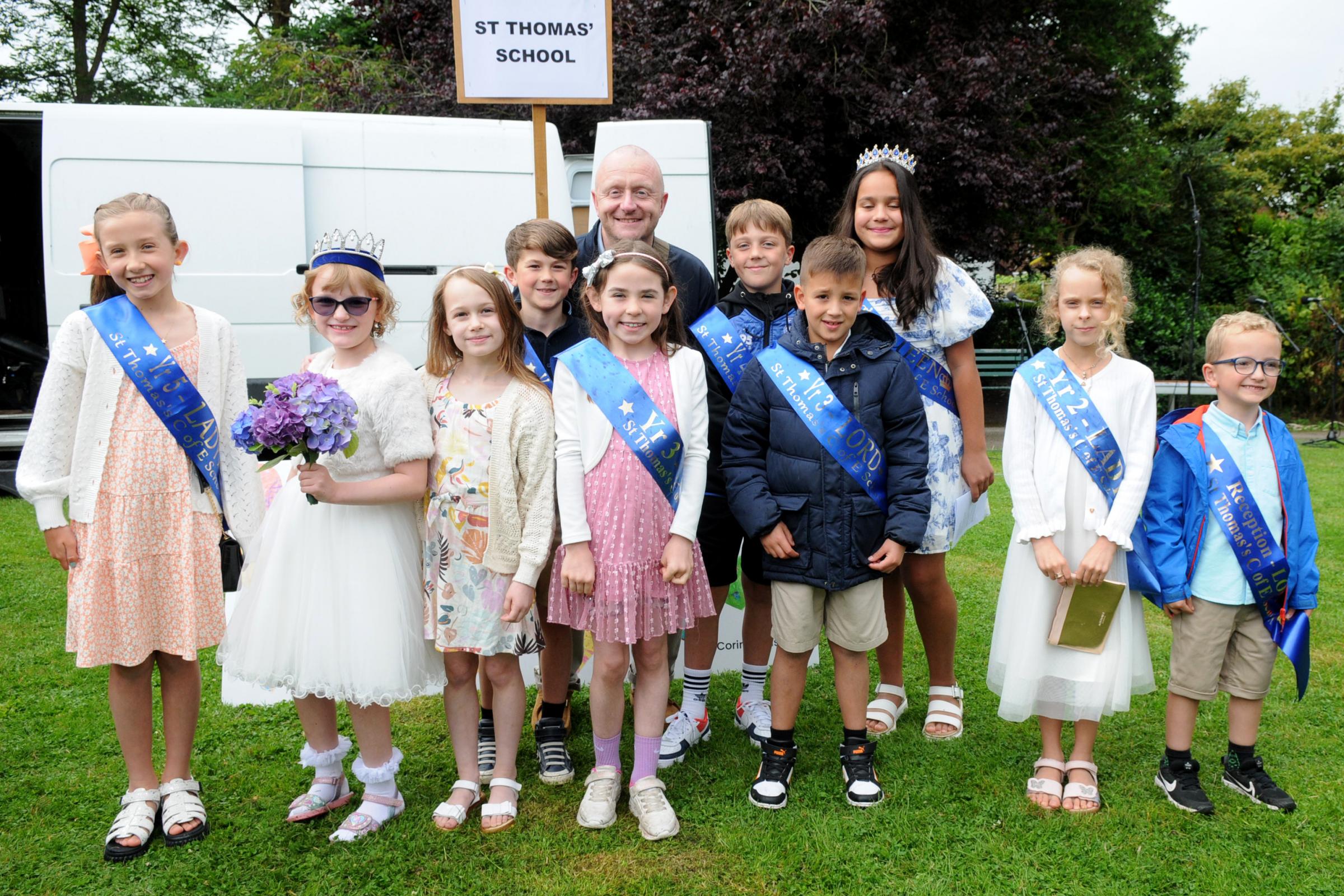 Children from St Thomas with head teacher Mr Moss