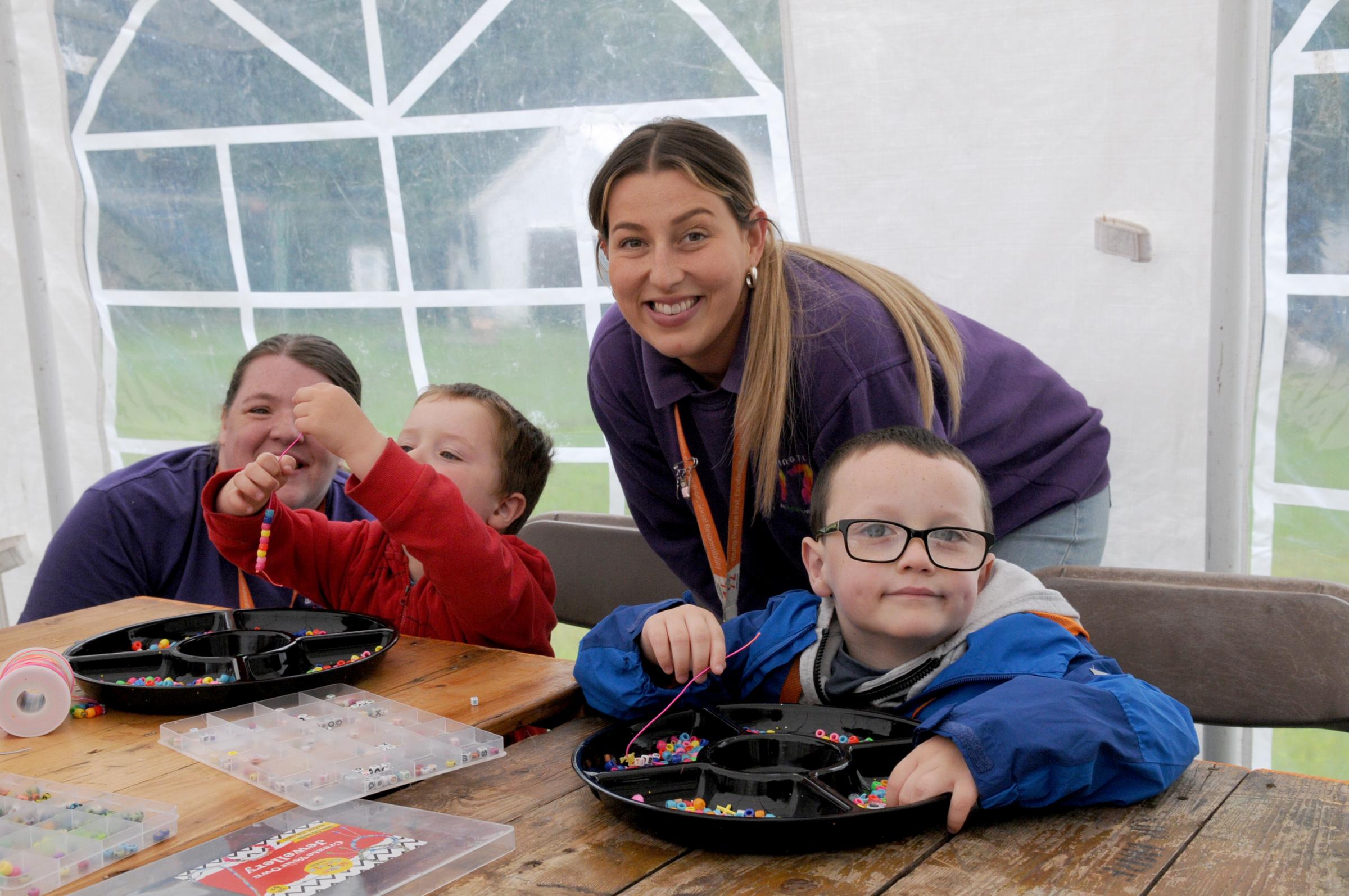 Joseph and Eric Baker with Jess Blenkinsopp and Isabel Rudge from Warrington Youth Zone