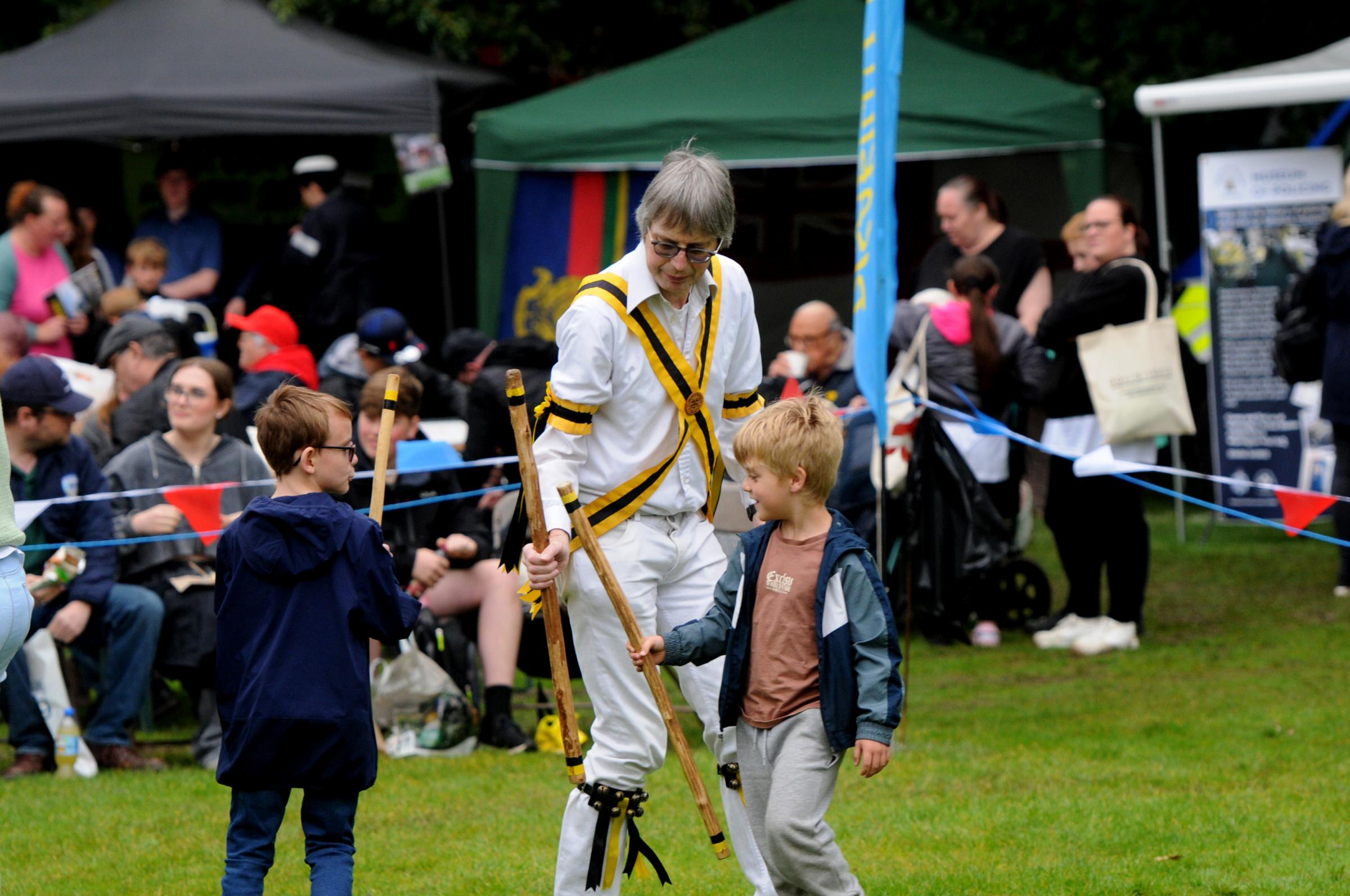 Earl of Stamford Morris Dancers get the audienve to join in