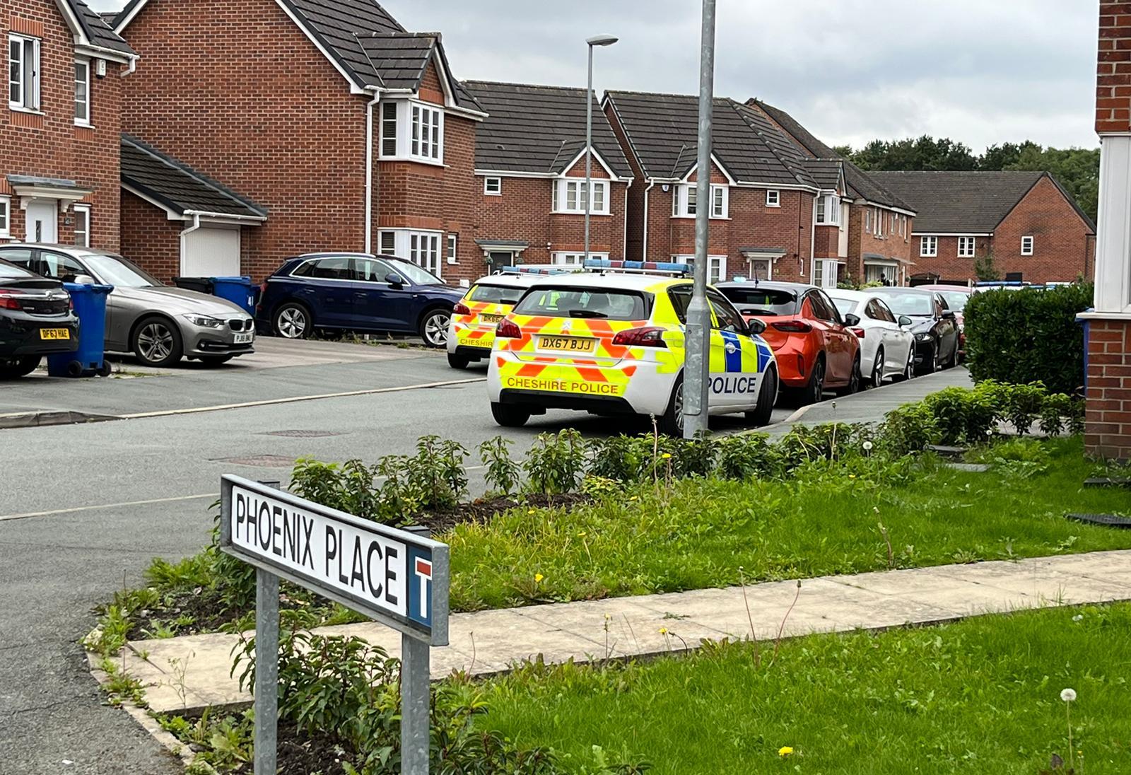 Police at the scene on Phoenix Place in Chapelford on the day of Ms McIntyres death