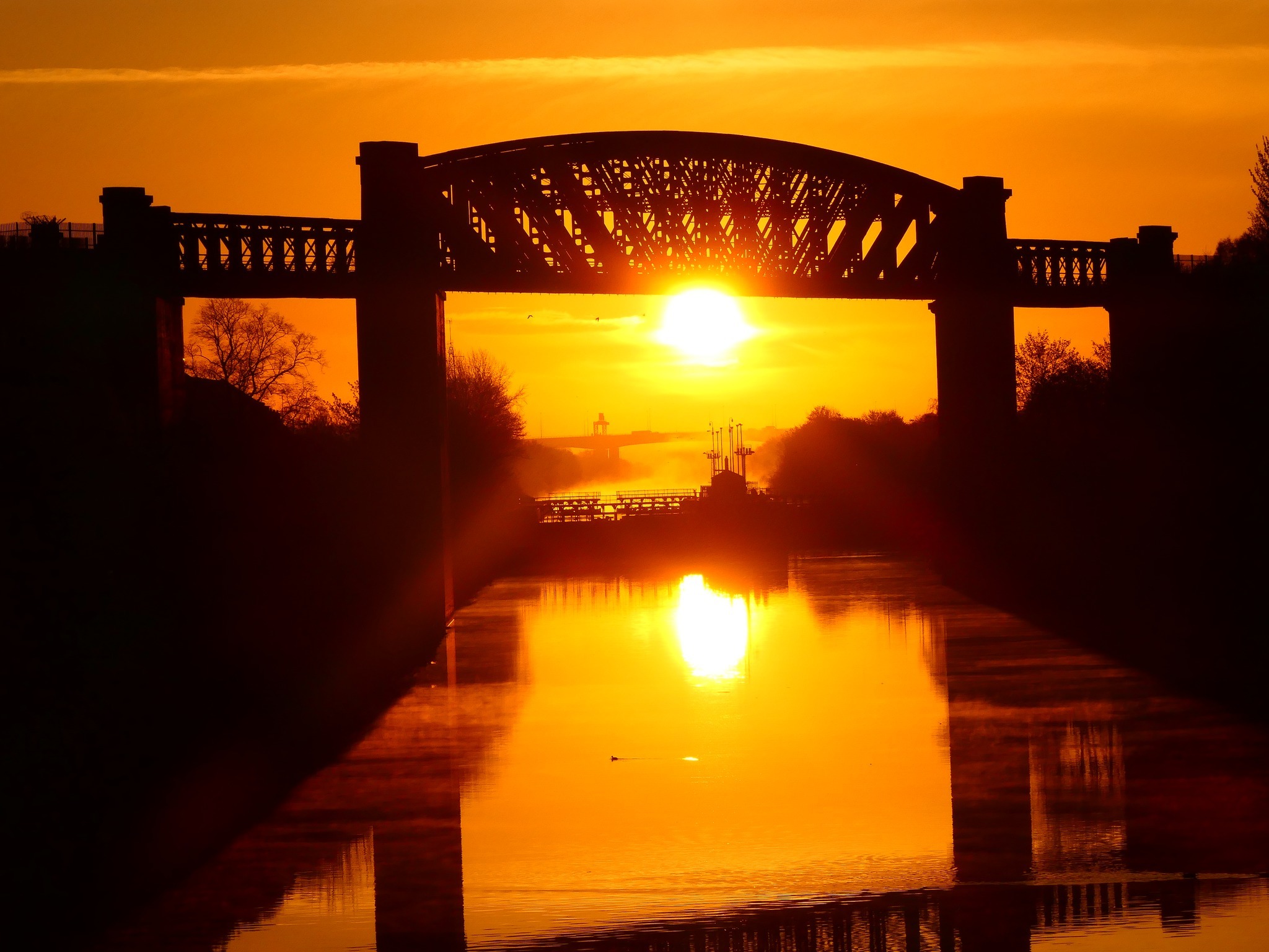 Sunrise over the Manchester Ship Canal by David Noble