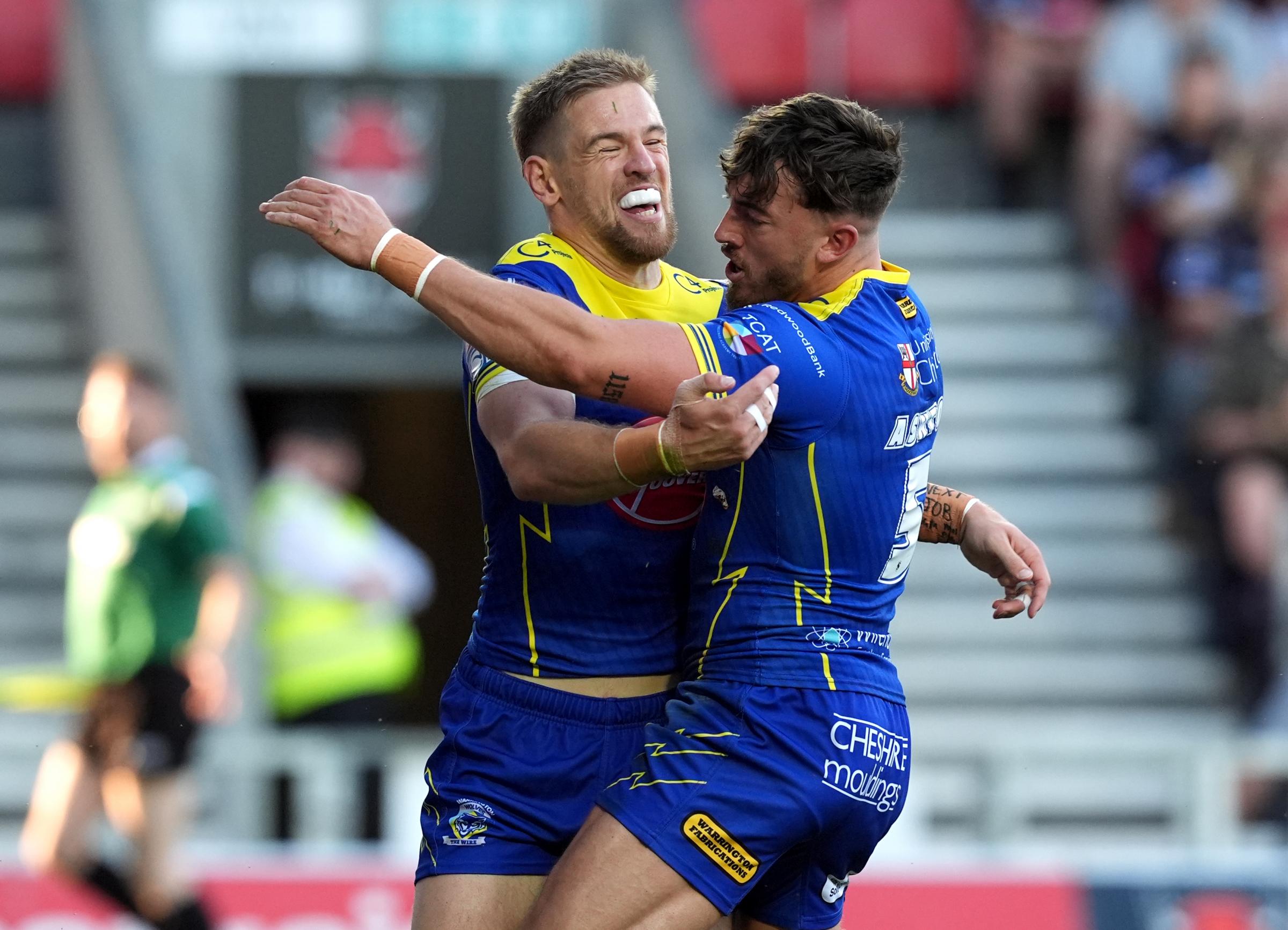 Wire stars Matt Dufty and Matty Ashton in action. Picture: PA