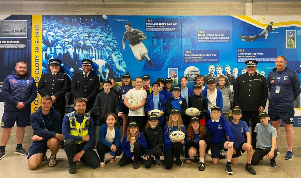 Cheshire Police officers with the mini police team at the Haliwell Jones Stadium