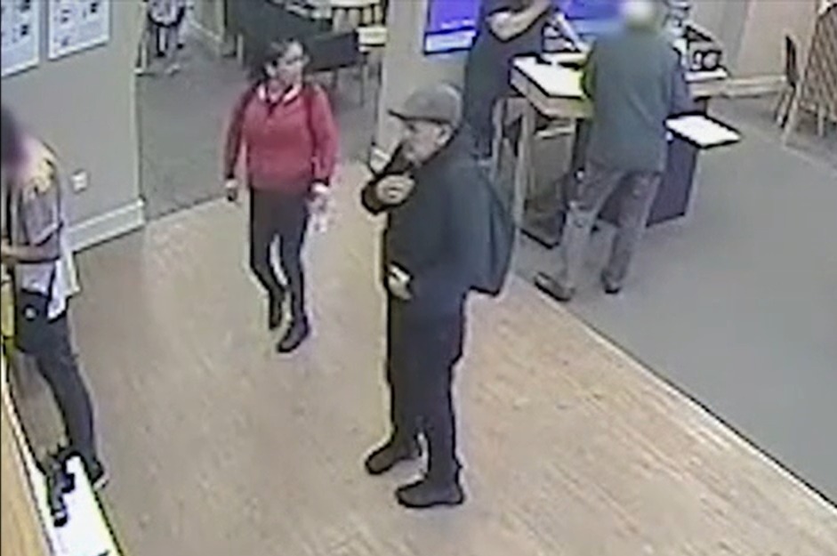 The perpetrators standing behind the victim in NatWest bank on Sankey Street. Picture: Cheshire Police/BBC