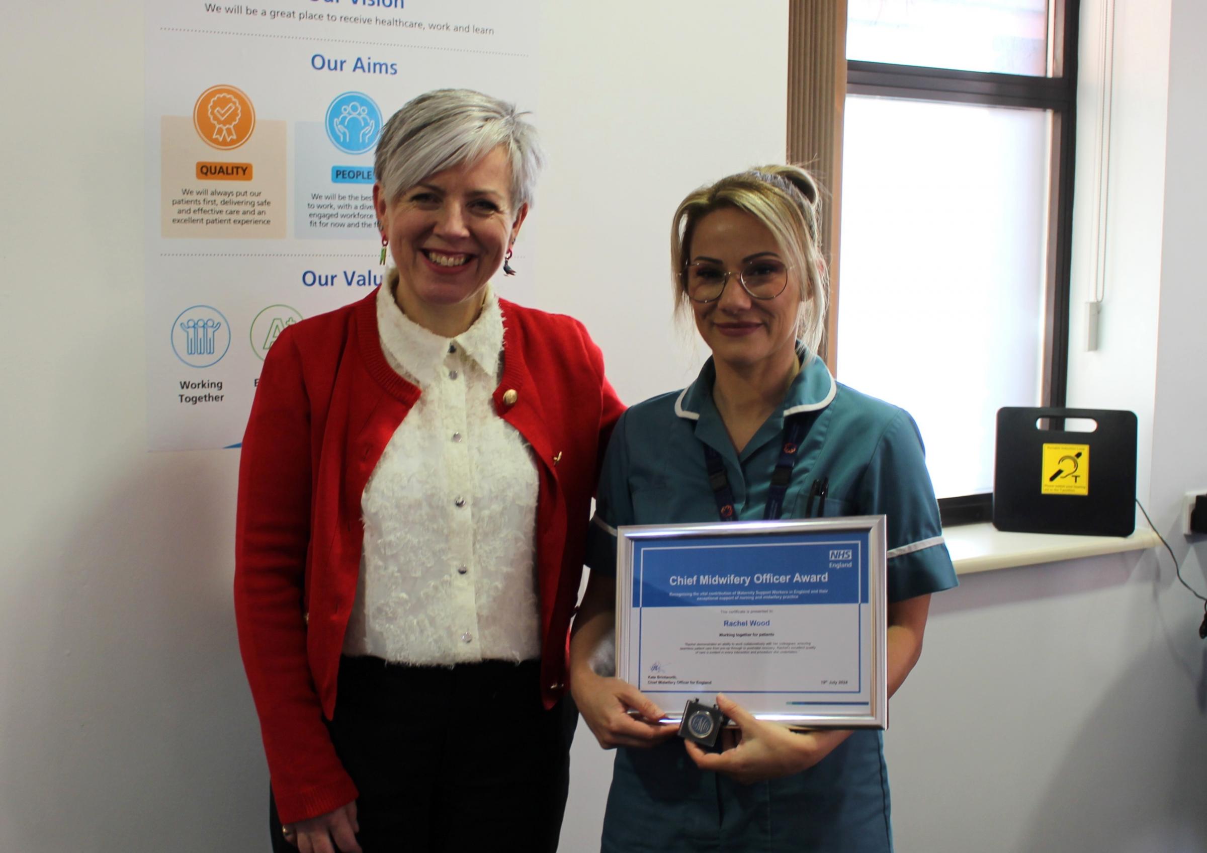 Kate Brintworth presenting Rachel Wood with the Chief Midwifery Officer Award