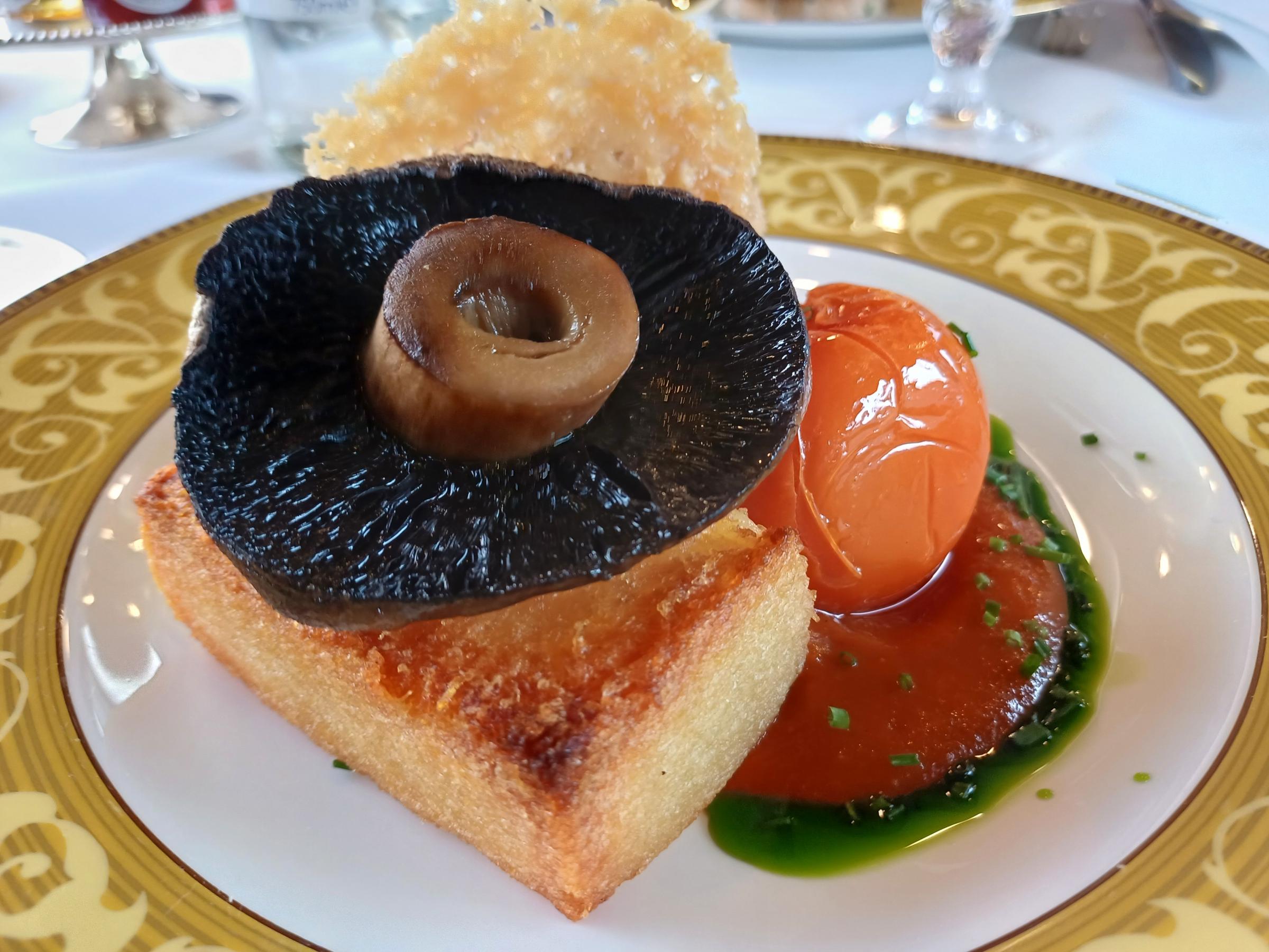 Potato rosti with wild mushroom croquette and tomato ketchup.