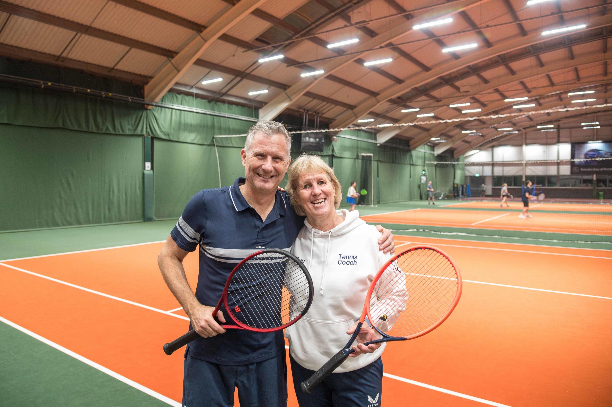 Adam Hills with Sue Taylor of Lusu Sports